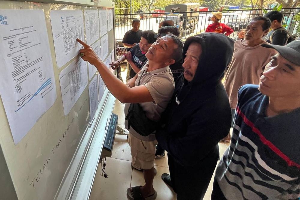Indonesia intensifies search for 129 people missing after ship capsizes