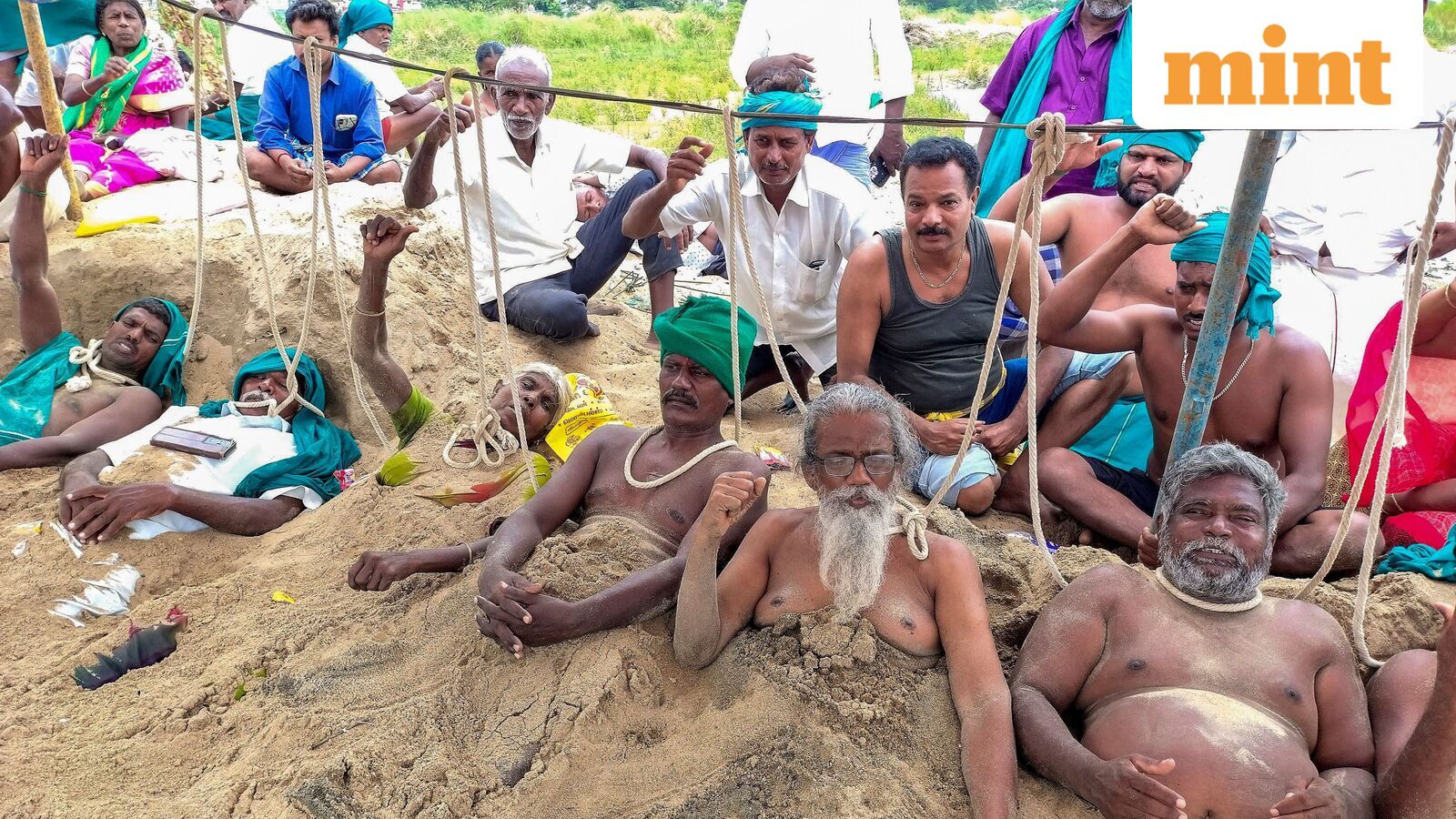 Cauvery water dispute: TN farmers bury themselves in sand to seek immediate release from Karnataka | Watch Video