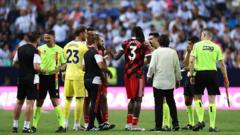 Fulham leave pitch as Malaga take penalty into empty net