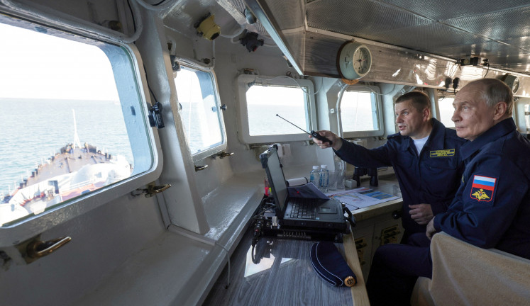 Putin visits disputed island near Japan, drawing Tokyo's ire