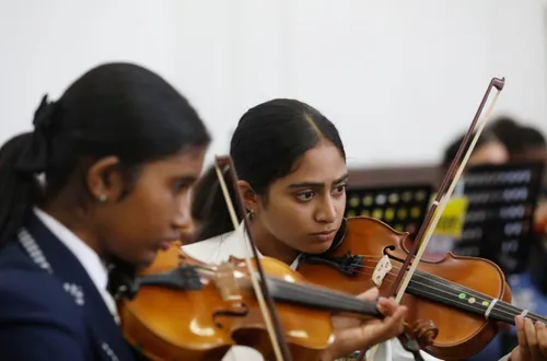 Pop-up orchestra of 143 musicians performs at Greyville concert