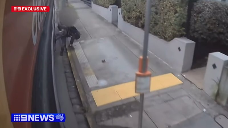 Child dragged along street after legs trapped inside bus