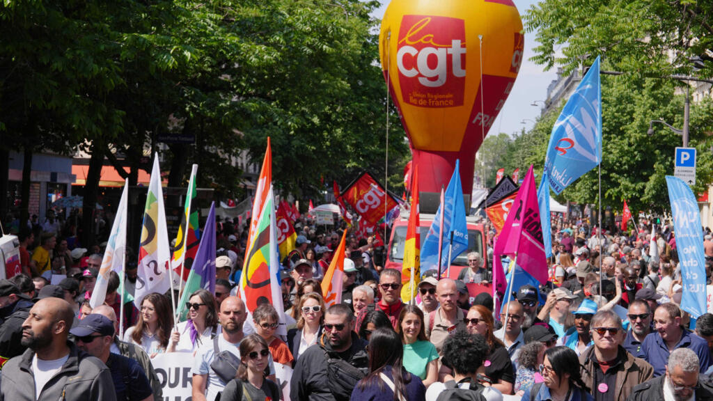 Workers across France stage protests over pay and rising costs