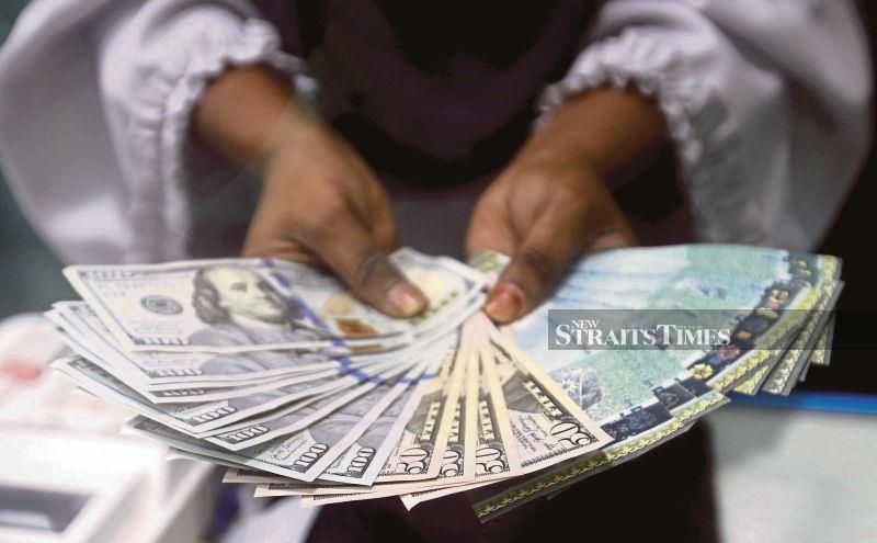 Ringgit ends almost flat against US dollar ahead of Q2 GDP data