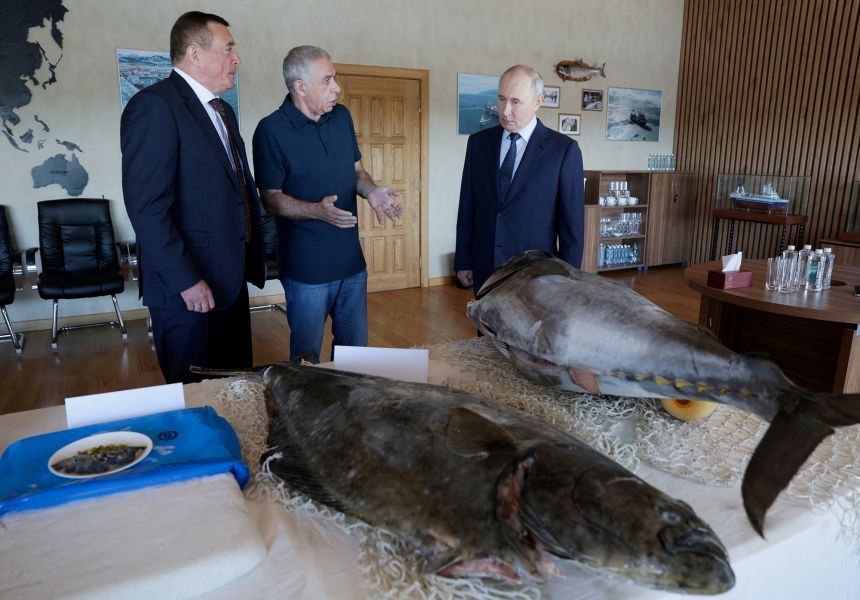 Putin pays his first visit to Pacific island chain claimed by Japan, drawing a protest from Tokyo