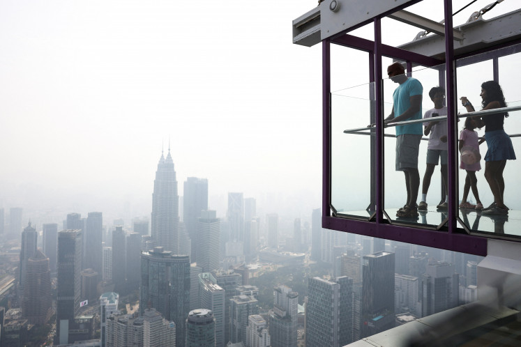 Indonesia fires surge as haze hits Malaysia