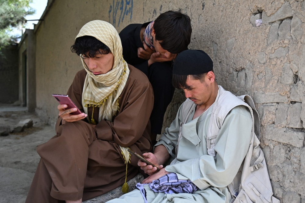 Afghan universities ban smartphones, students split over study disruption or improved focus