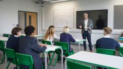 Schools in England get extra £500m in bid to avoid teachers' pay strike