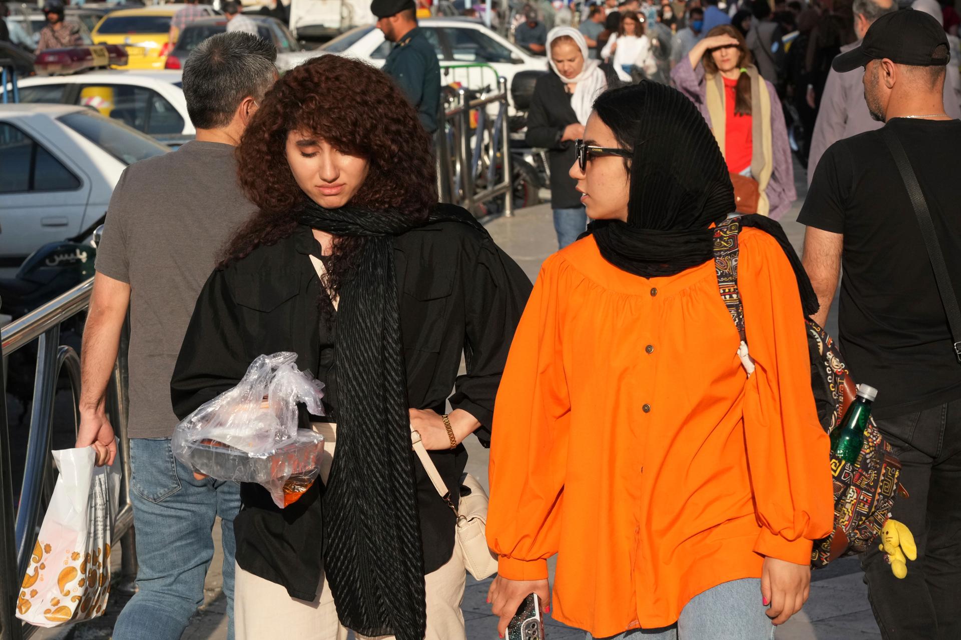 Iran hesitates to enforce headscarf rules amid war, economic pressures