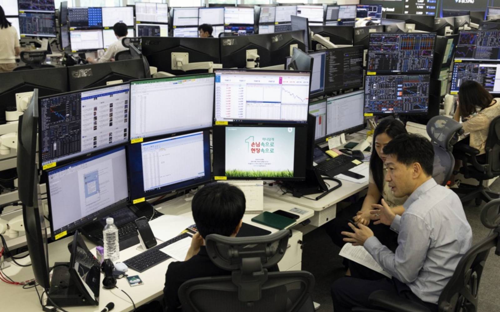 Most stocks rise as Fed hikes rates, signals drive to curb inflation