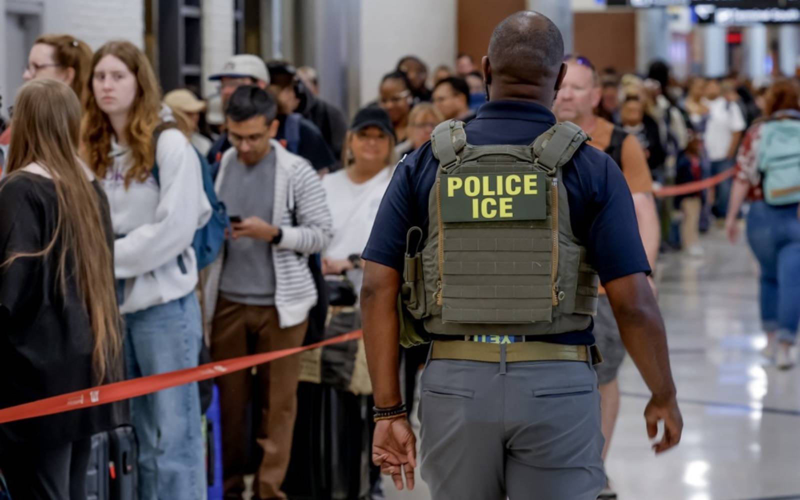 ICE agent charged with assault, lying about shooting