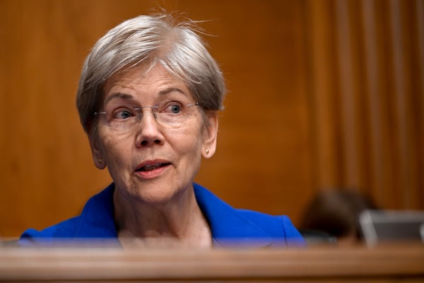 Warren and Democrats are demanding Trump reveal who's managing his stock portfolio