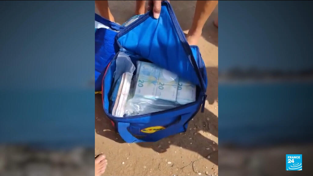 How did nearly 700,000 euros in cash wash up on a Sicilian beach?