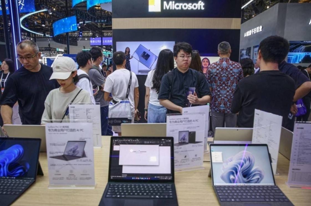 Microsoft retreats in China, but AI helps it keep a window open