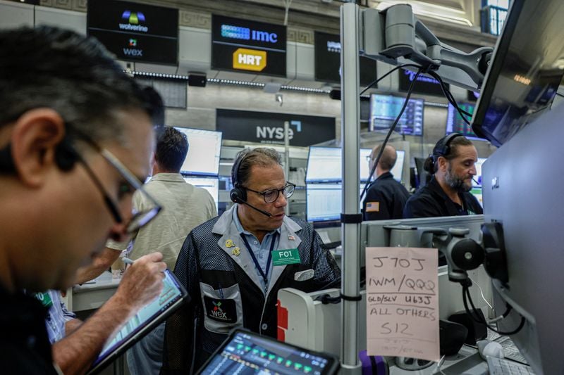 S&P 500 notches record-high close as rate-hike worries ease