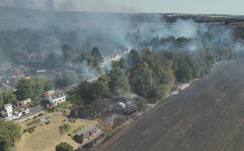 Wildfires tear through UK homes, force evacuations