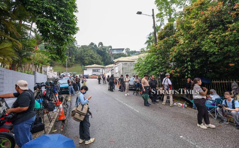 Media camp outside Najib's residence following conditional house arrest