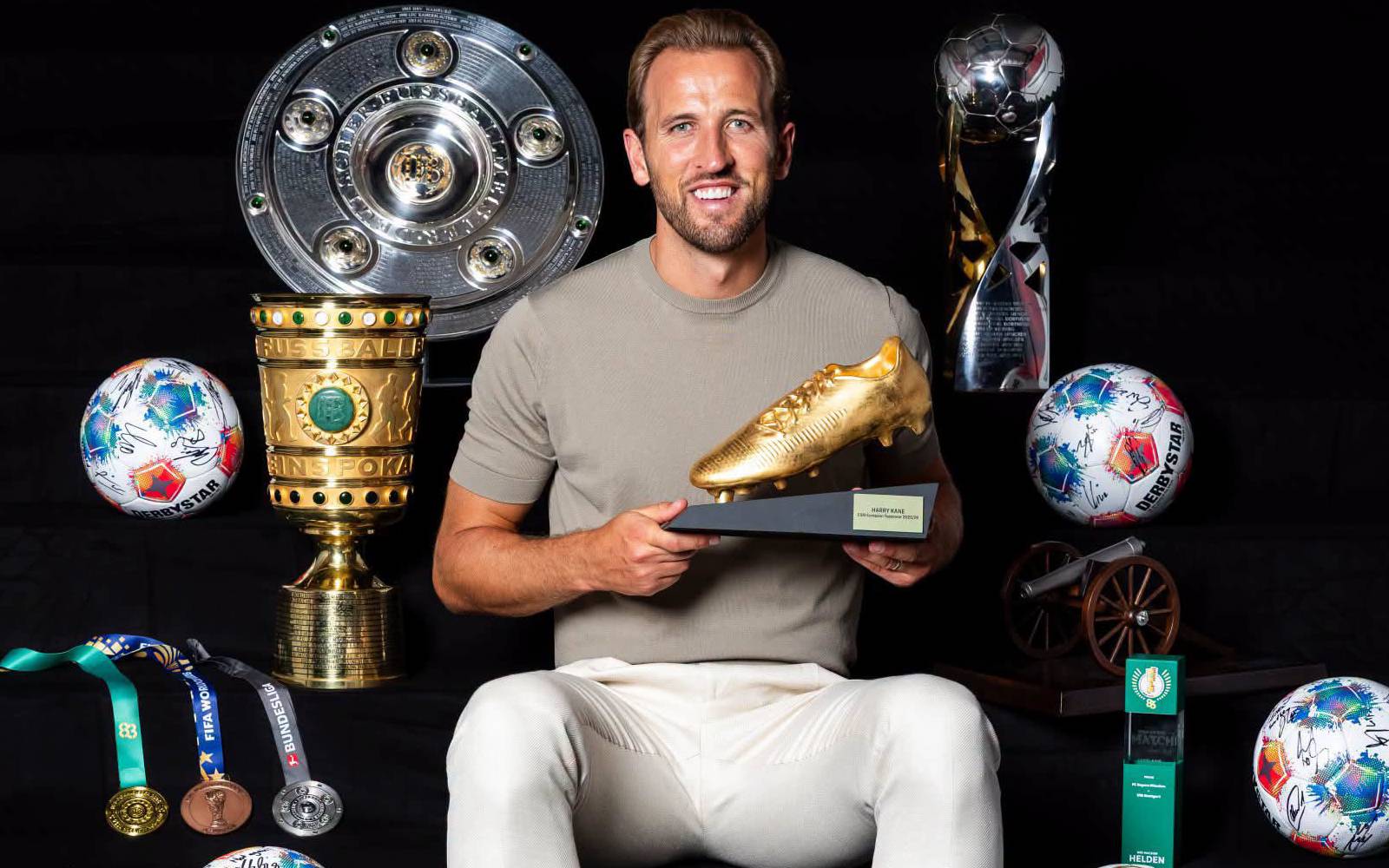 Kane plays down Ballon d’Or talk despite stellar season