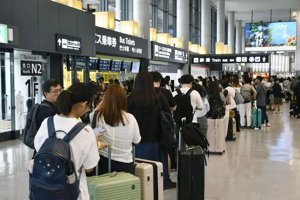 Thousands stranded at Japan's Narita airport after record rain kills four