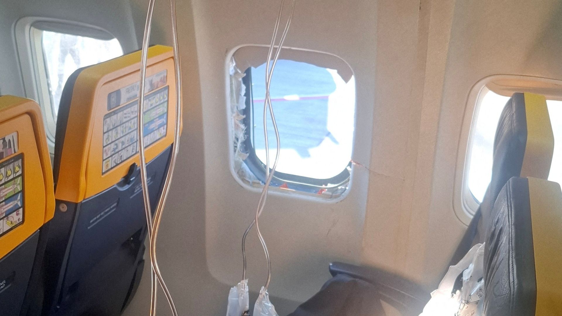Revealed: What caused man to be partially sucked out of plane