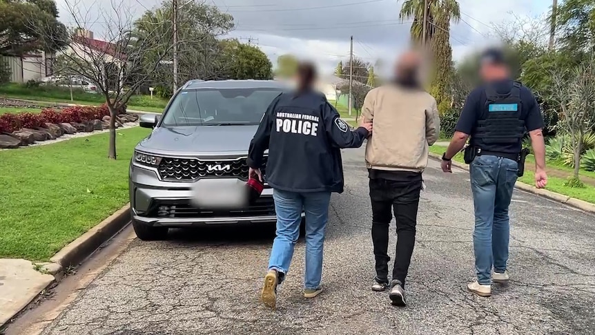 SA man charged for alleged threatening messages targeting AFP