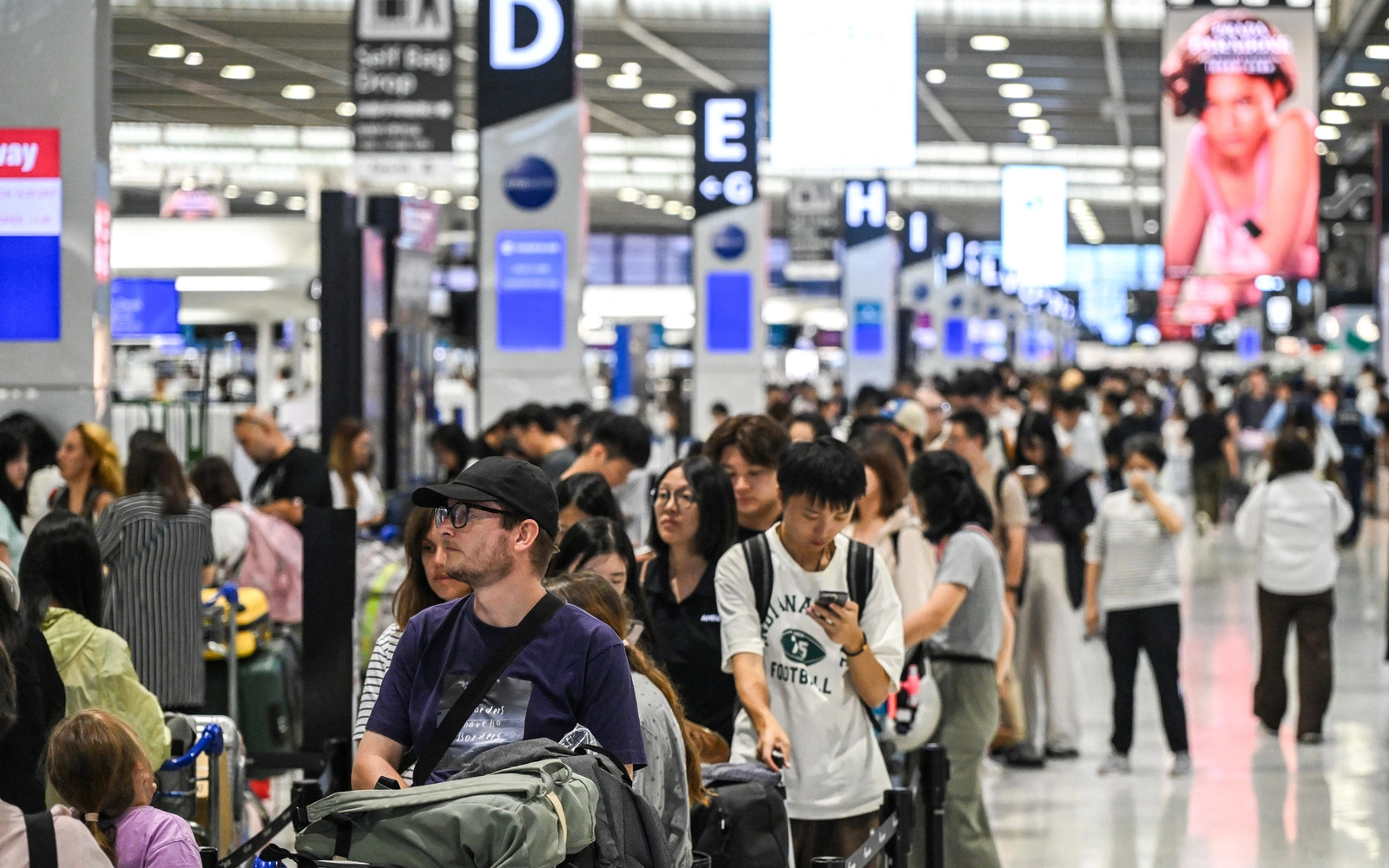 Thousands stranded at Japan’s Narita airport after record rain kills 4