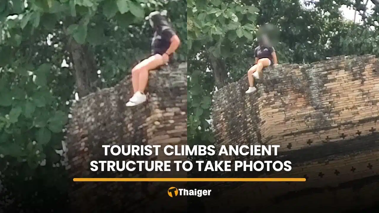 Tourist criticised after climbing Chiang Mai ancient wall for photos
