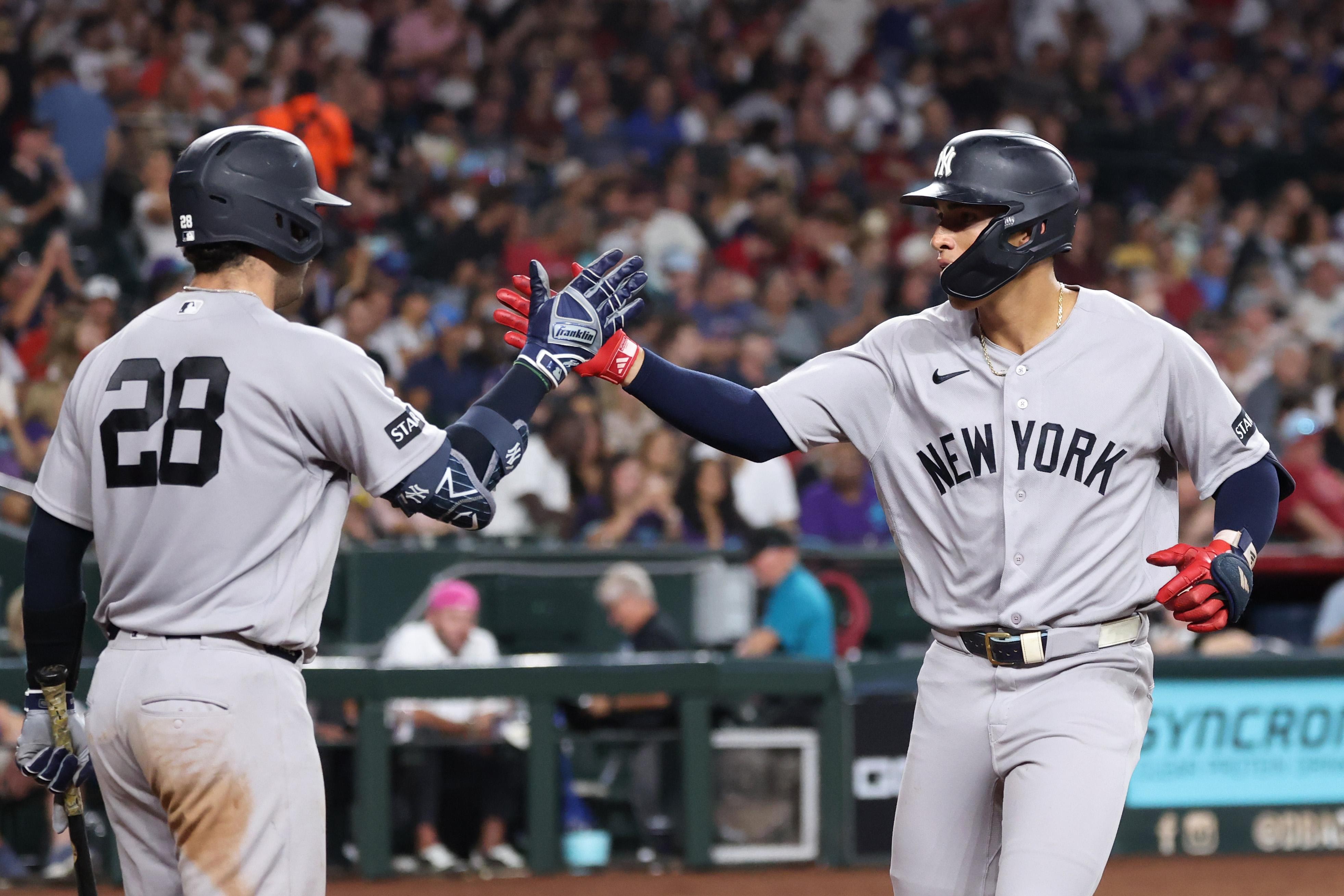 Yankees ride five-run first to series-opening romp of Diamondbacks