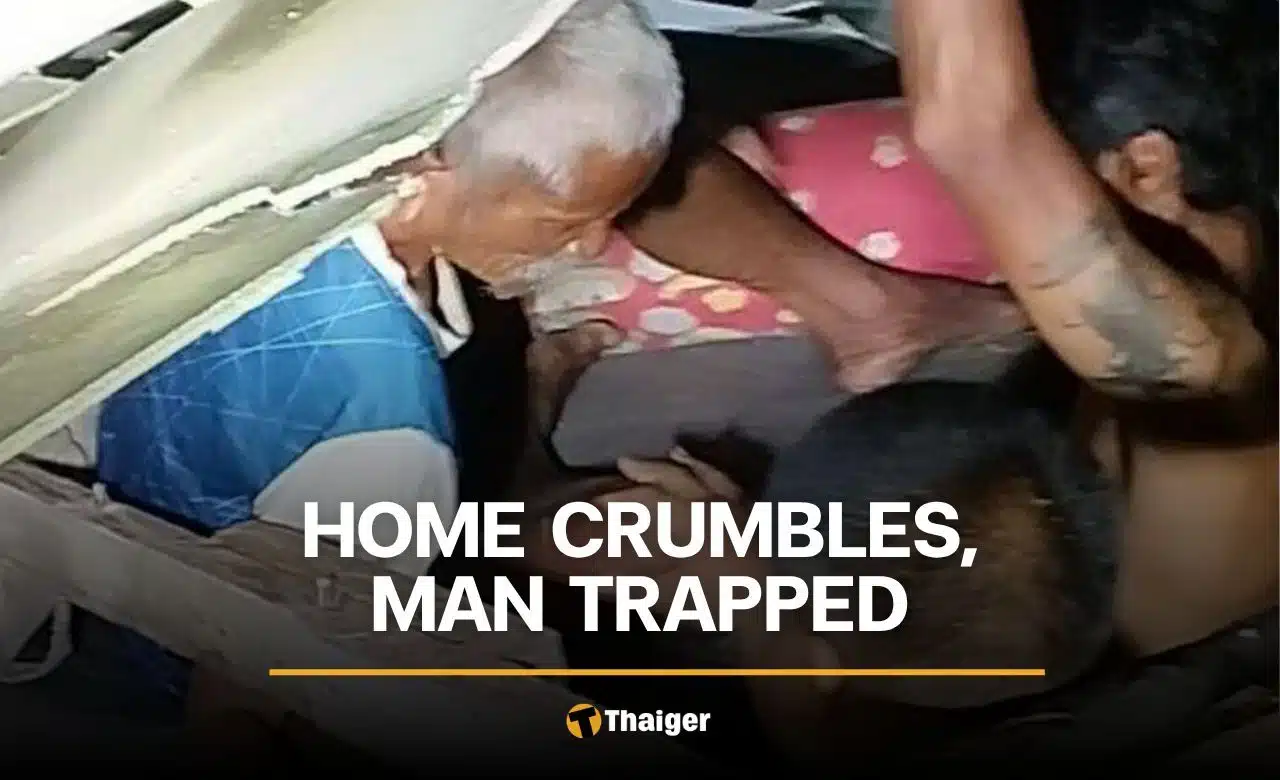 Neighbours dig out a 70-year-old man after his old wooden house collapses