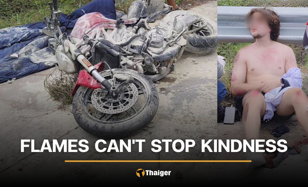 Russian rider goes to help the other motorcyclist as his own Ducati burns