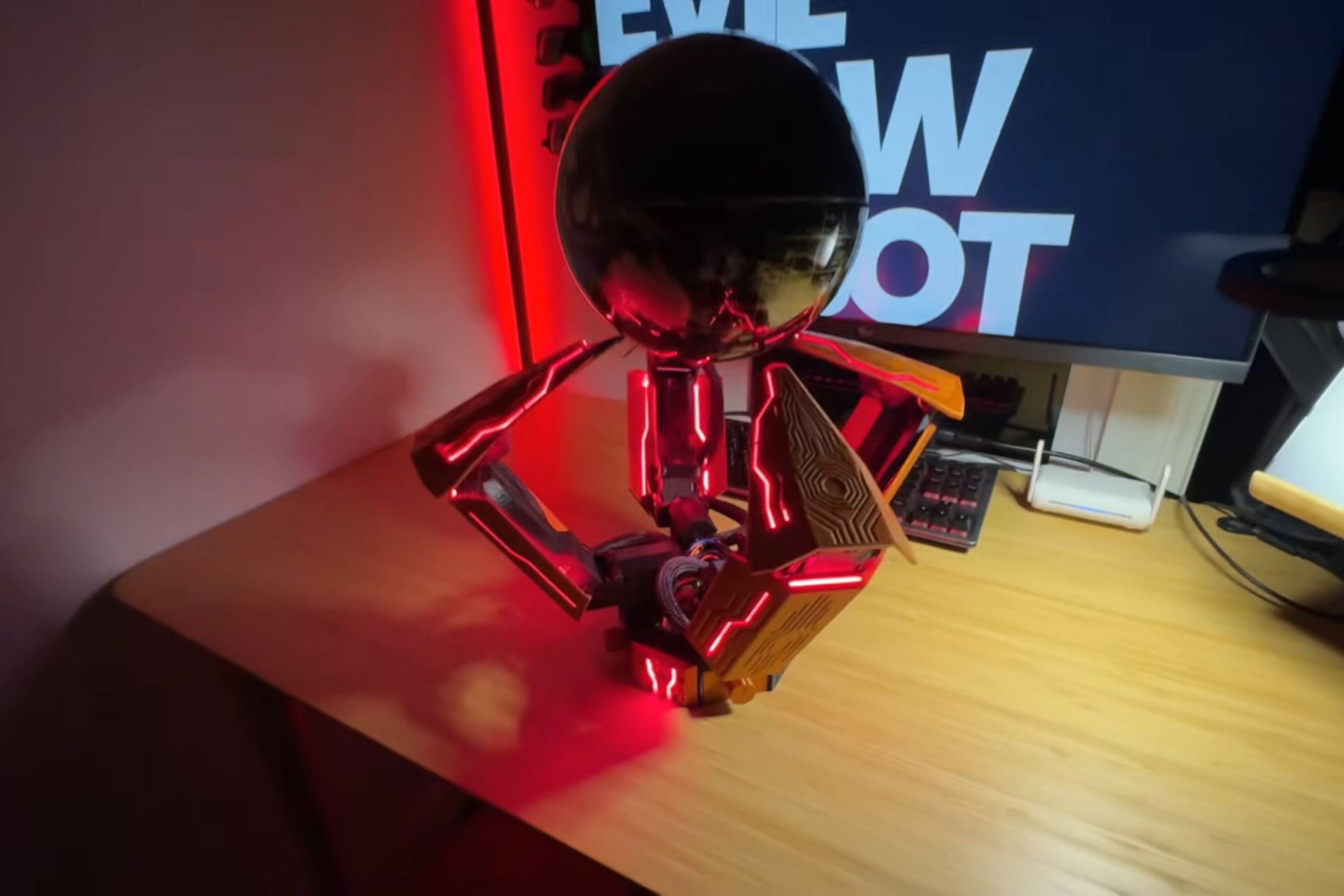 This Arduino-powered robot claw spins a globe between its fingers like it came from a supervillain's lair