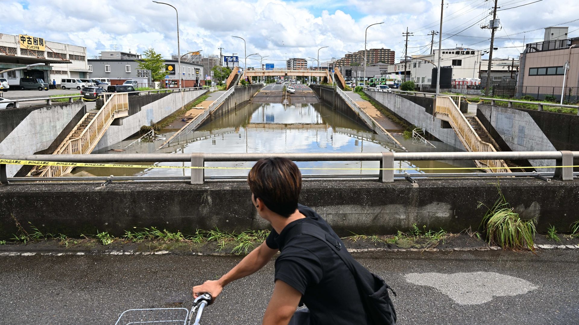 Four dead in Japan after record-breaking rainfall causes severe flooding