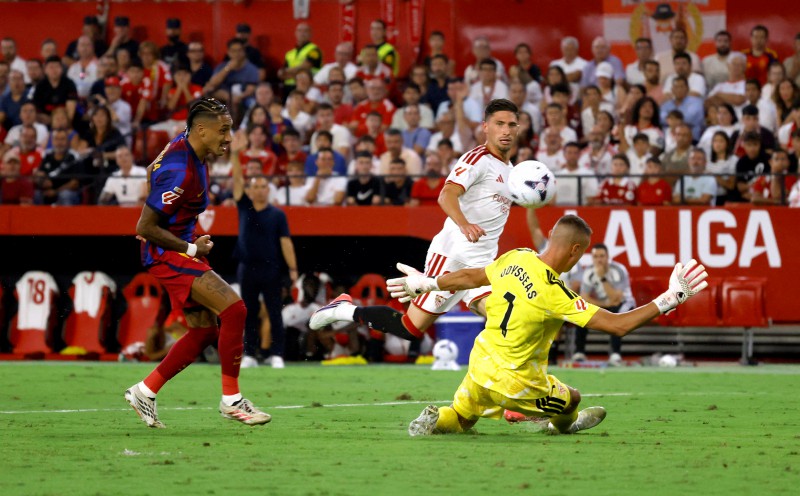 Raphinha treble fires perfect Barca to win at Sevilla