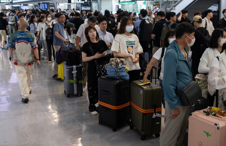 Thousands stranded as heavy rain kills at least four in Japan