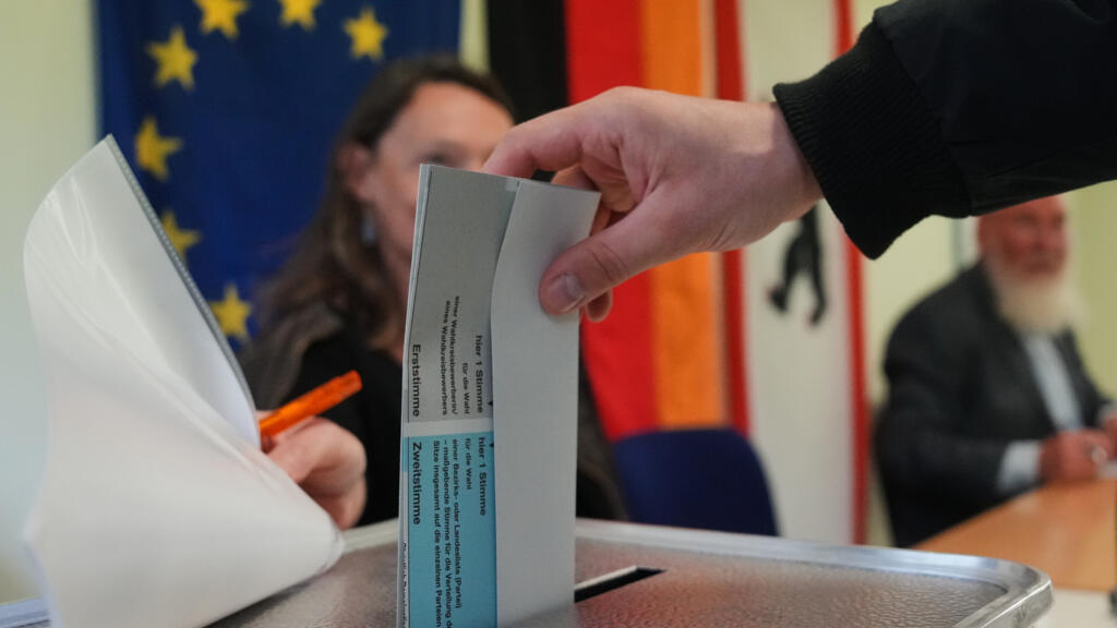 Germans vote in elections threatening fresh blow to Merz