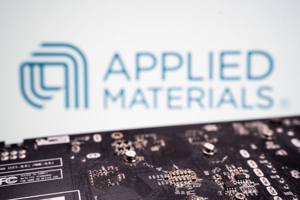 Applied Materials posted record revenue and raised its chip equipment outlook on AI demand