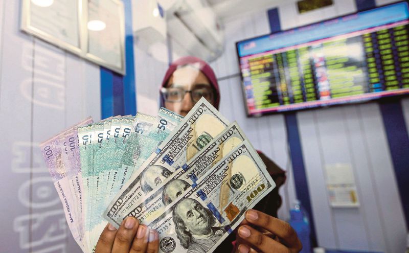 Ringgit firmer against US dollar on stronger-than-expected GDP growth