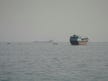 U.S. warns Iran of more economic pressure as Hormuz vessel traffic slows