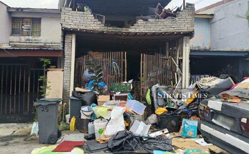 Two tonnes cleared, rubbish mountain returns at Permas Jaya home