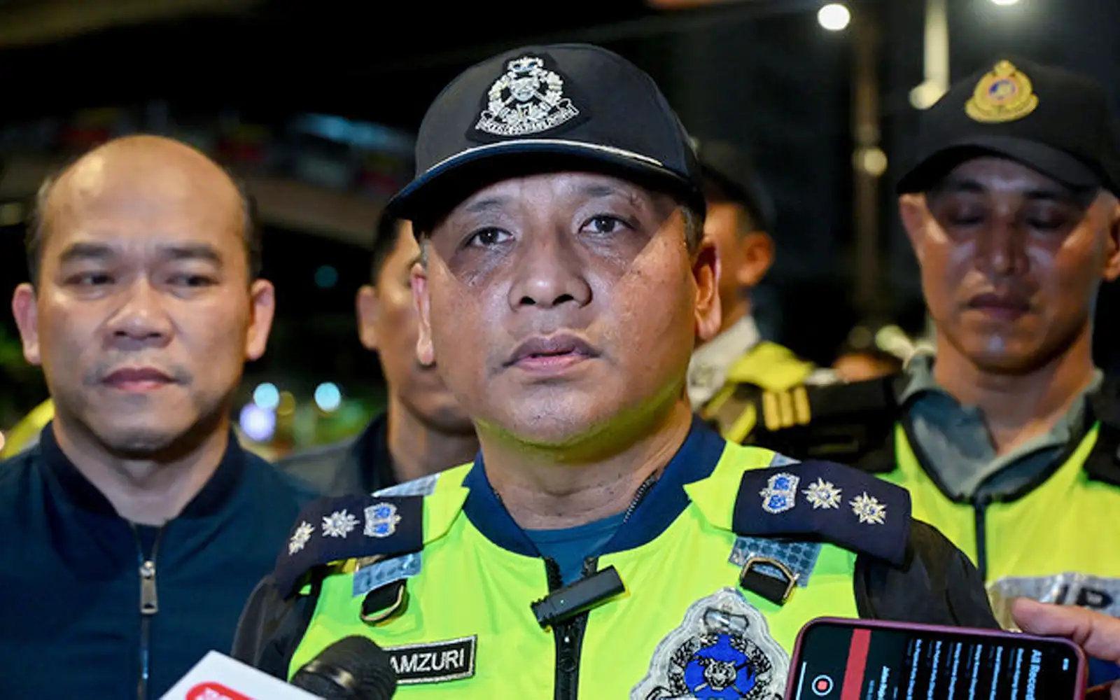 Motorcyclist killed after falling into lorry’s path following car collision