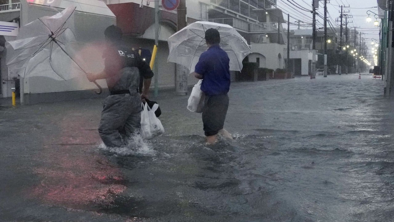 Over 1.6 million in Japan urged to evacuate as Typhoon Dujuan nears Tokyo