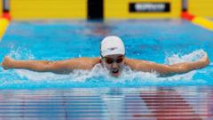 Swimming sensation Yu, 13, wins second Asian Games gold