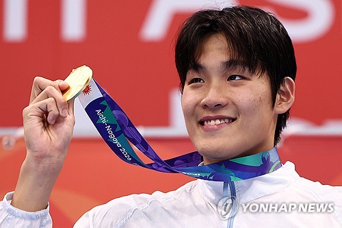 (Asiad) Young swimmer soars to gold; baseball team opens title quest with win
