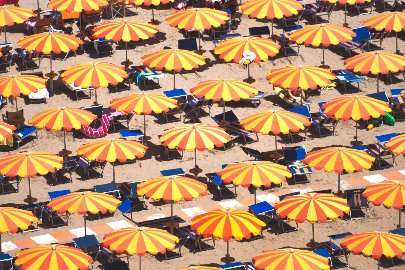 Why sitting under a parasol is barely cooler than being in the sun