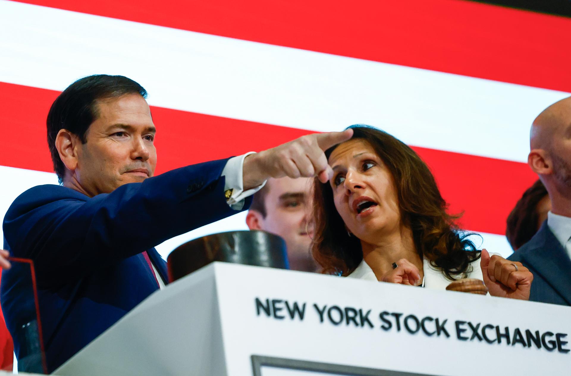 Wall Street nears record as oil prices, bond yields ease