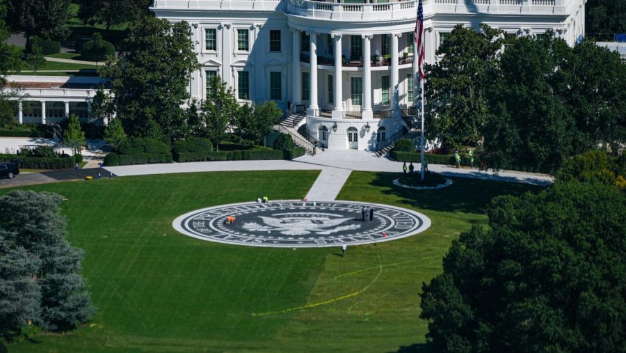 Trump inaudible at helipad ribbon cutting amid press pool fight