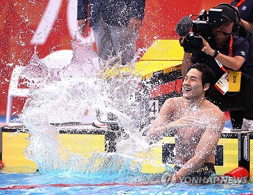 (Asiad) Swimming coach calls new champion work in progress