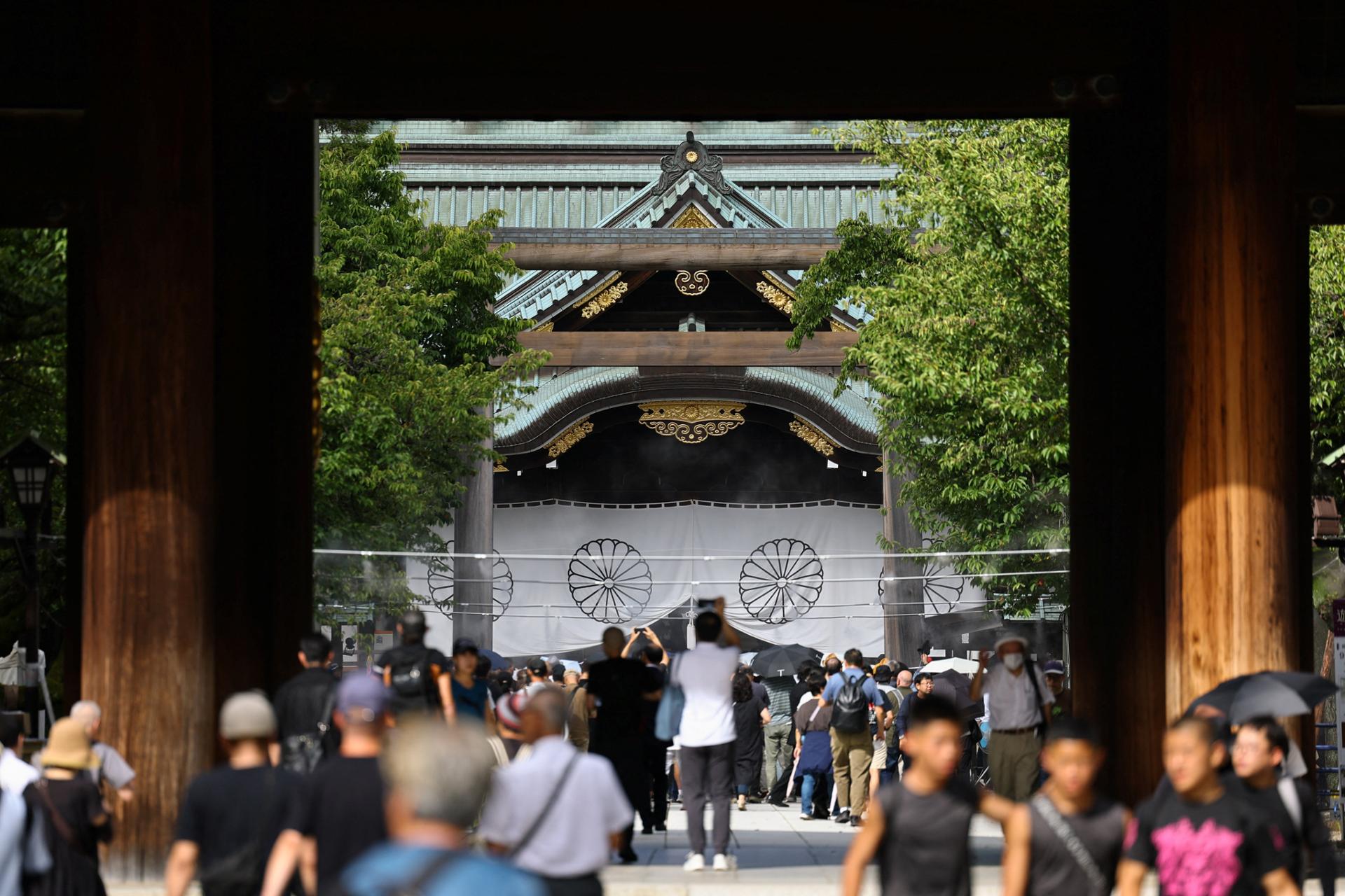 Japan's Defense Minister Koizumi prays at shrine seen by neighbors as symbol of Japanese militarism