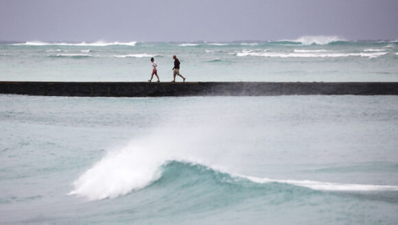 Hawaii Faces Rare Hurricane Strike as Storms Batter Indiana