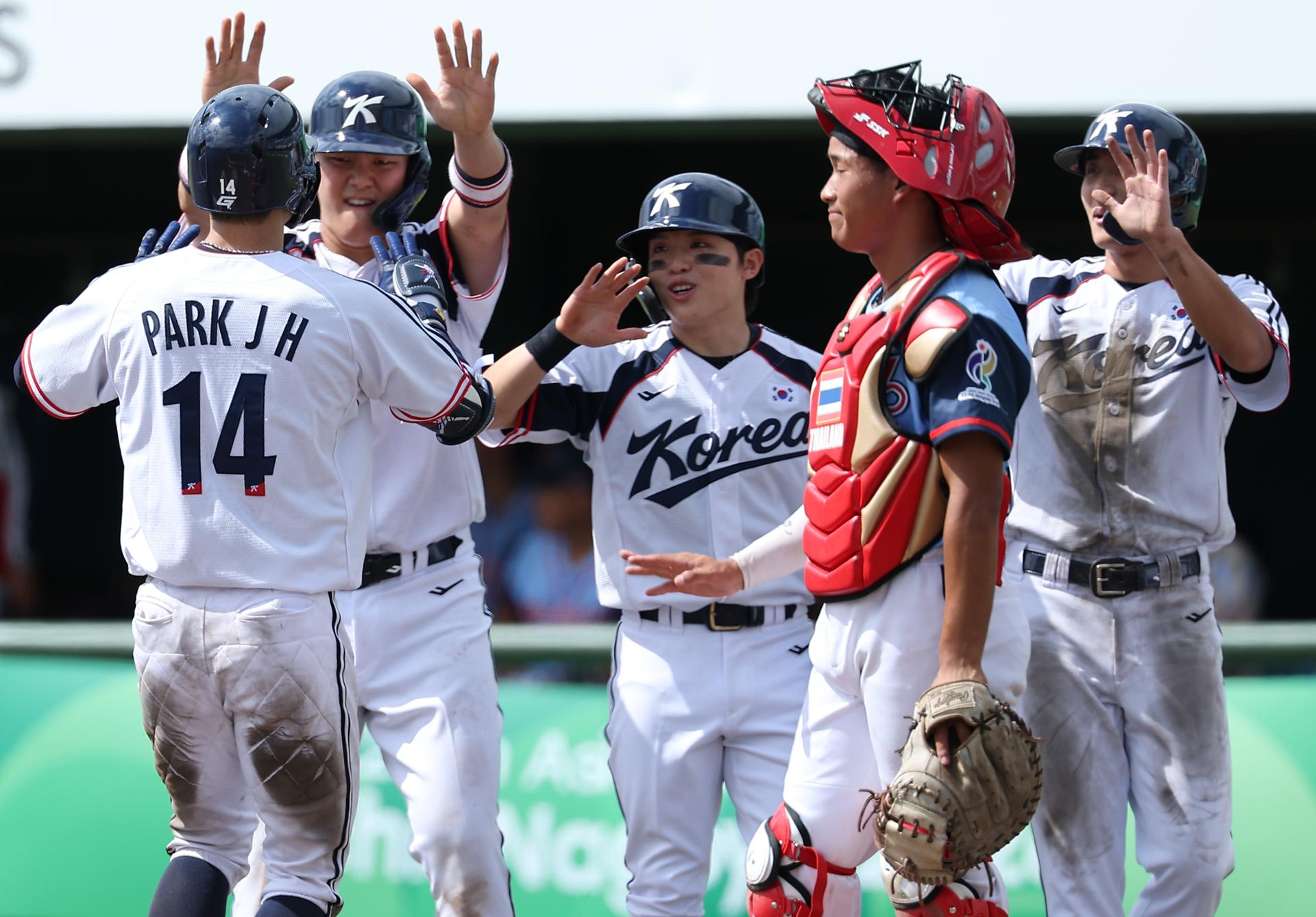 S. Korea clobbers Thailand to reach next phase in baseball